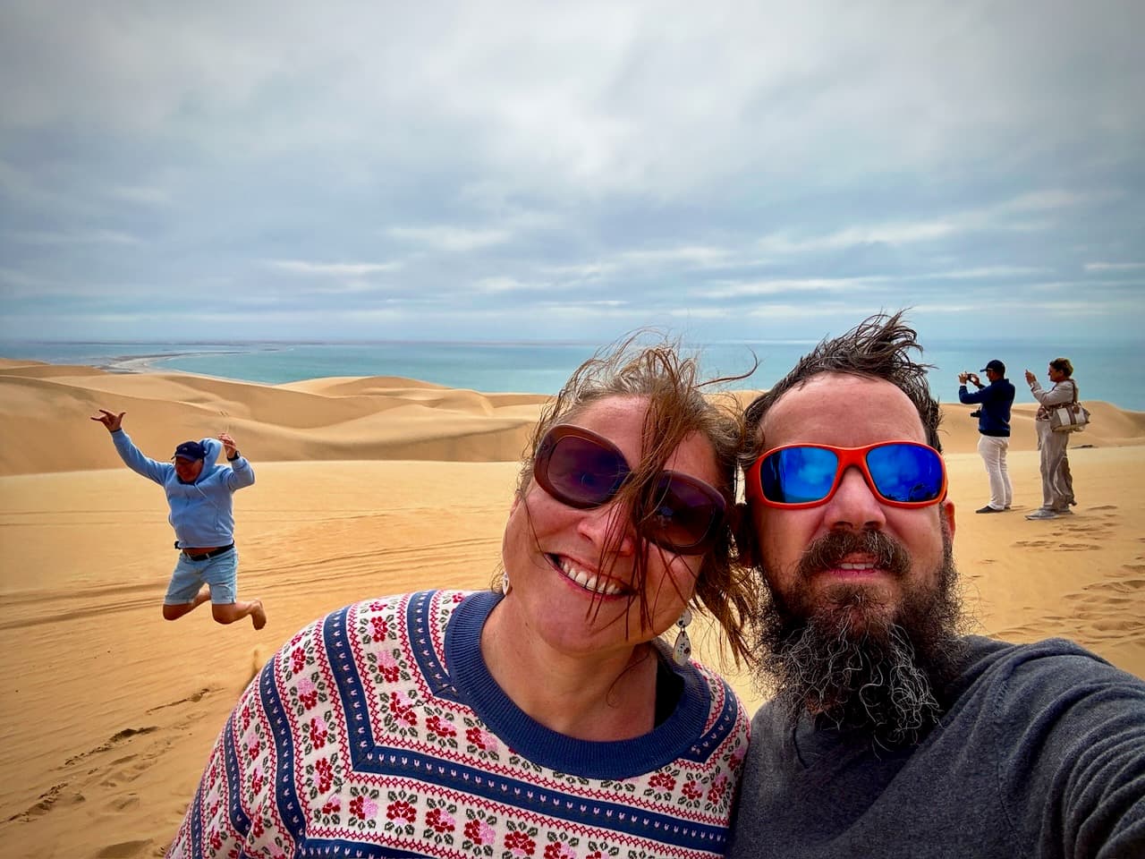 A selfie above Sandwich Harbour, photobombed by a fellow jumper