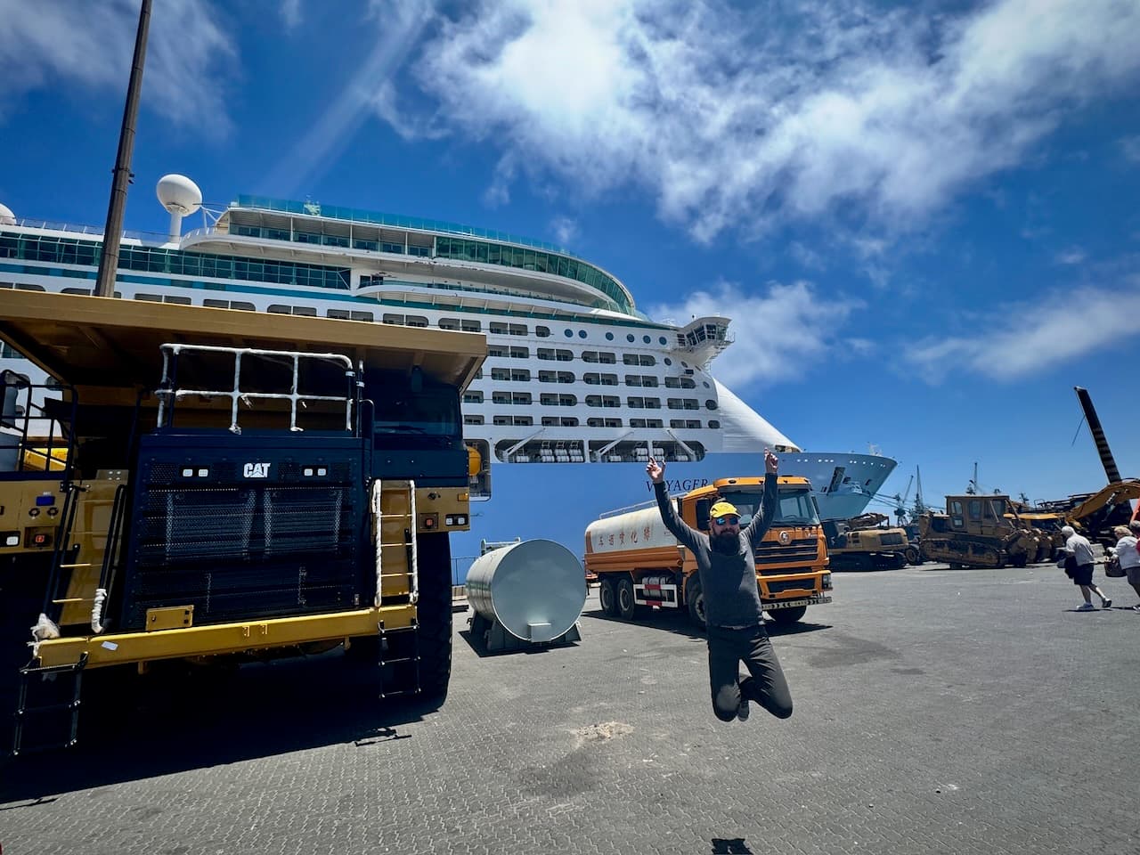 Jumping on the dock in Walvis Bay, between mining trucks and our cruise ship