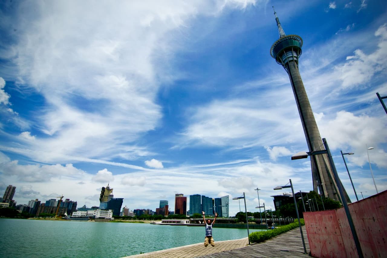 Jumping in front of Macau Tower