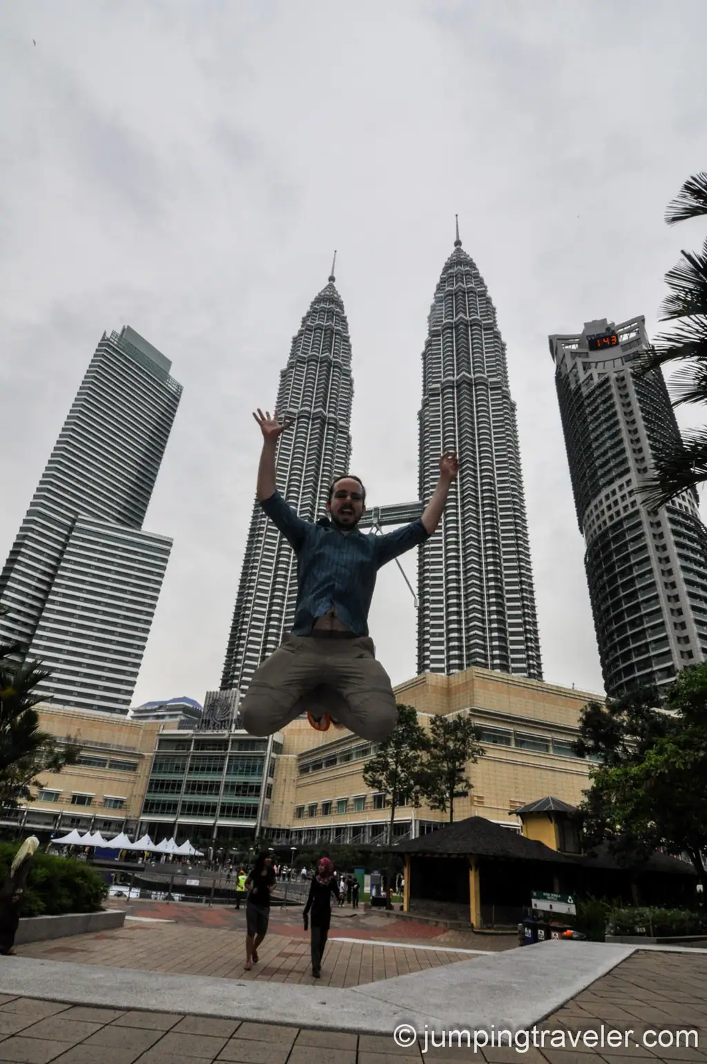 Jumping in front of Petronas Towers in Kuala Lumpur