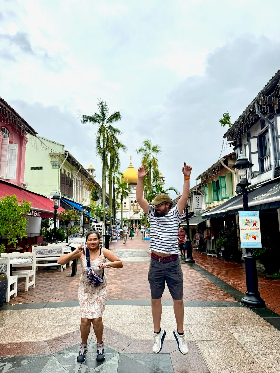 Sylvain and Laurent jumping in front of Sultan Mosque in Singapore