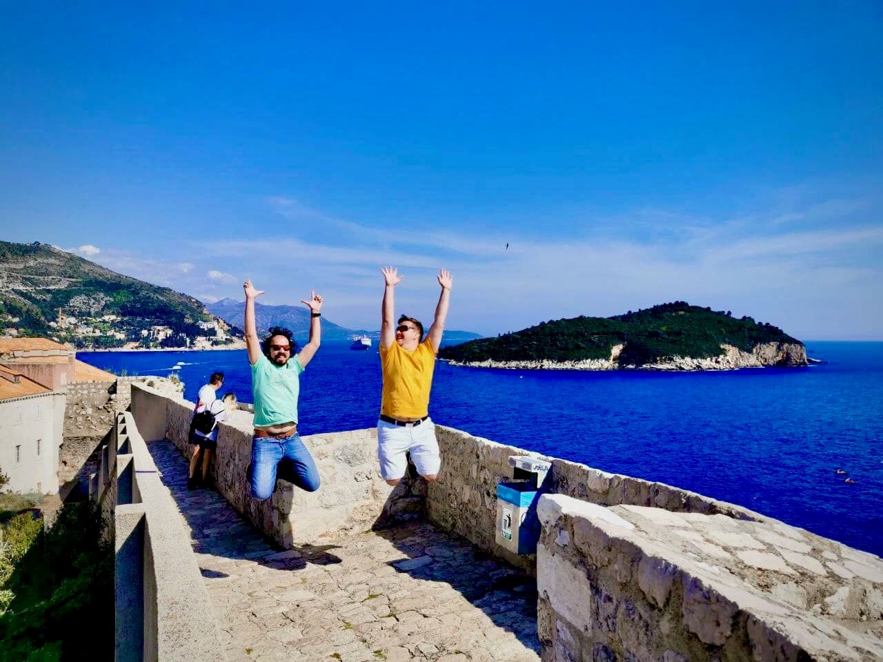 Joss and Sly jumping on the old walls in Dubrovnik