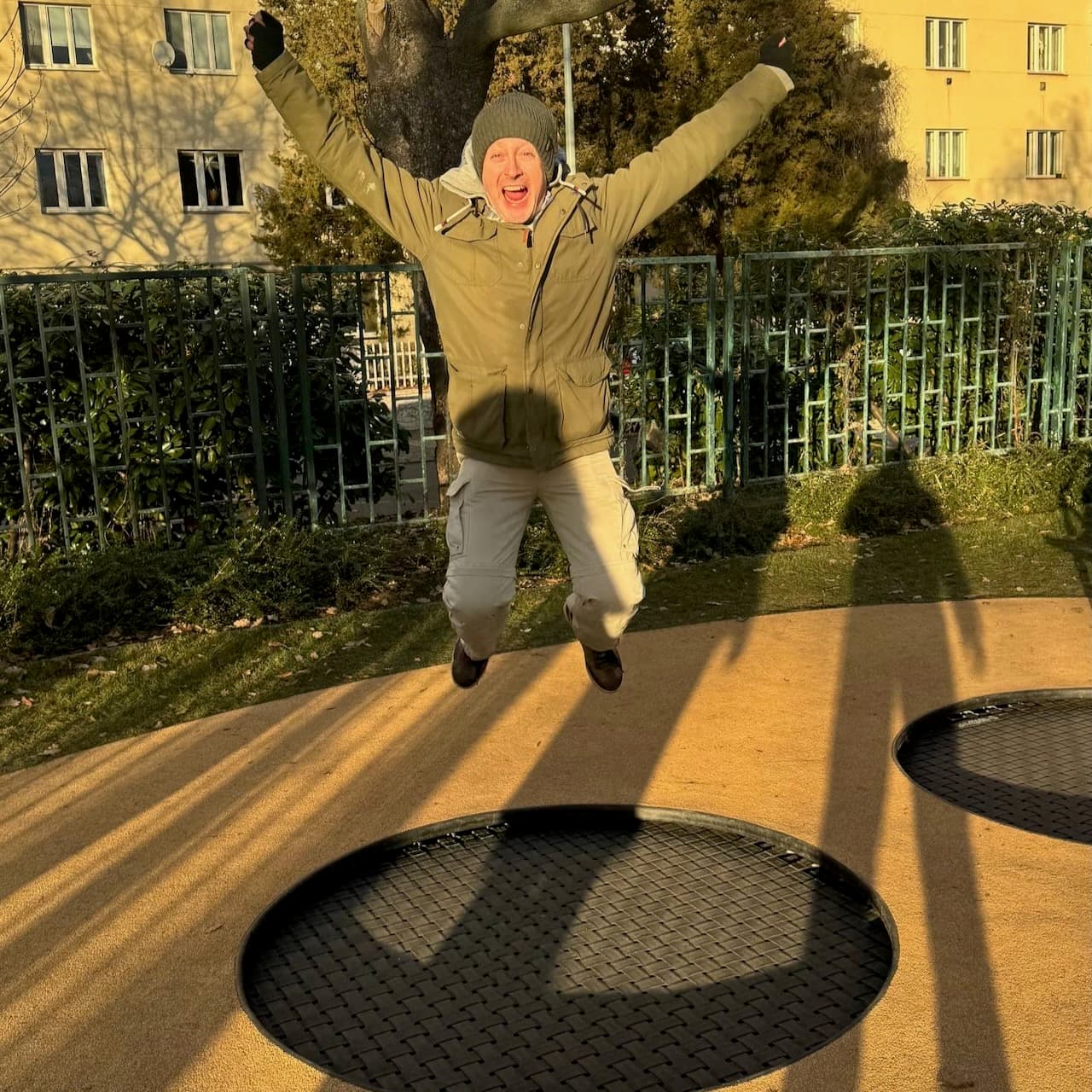Fred joining in on the trampoline, in the low winter sun