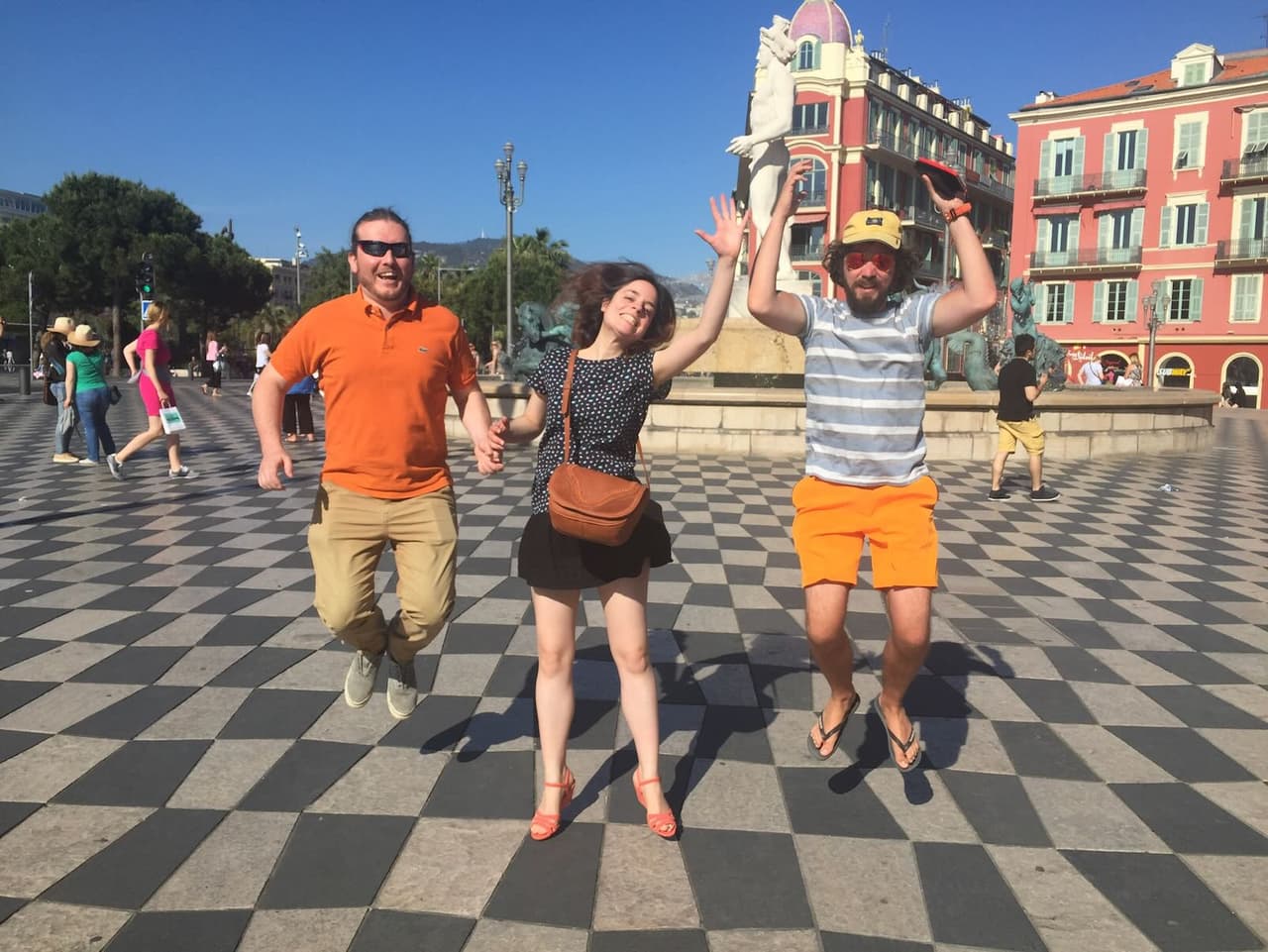 Jumping with friends in Place Massena, Nice
