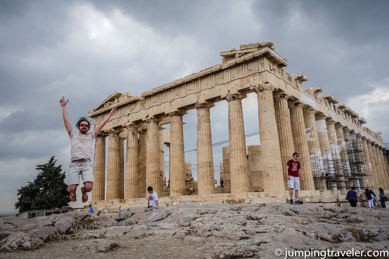 Jumping in front of the Acropolis in Greece