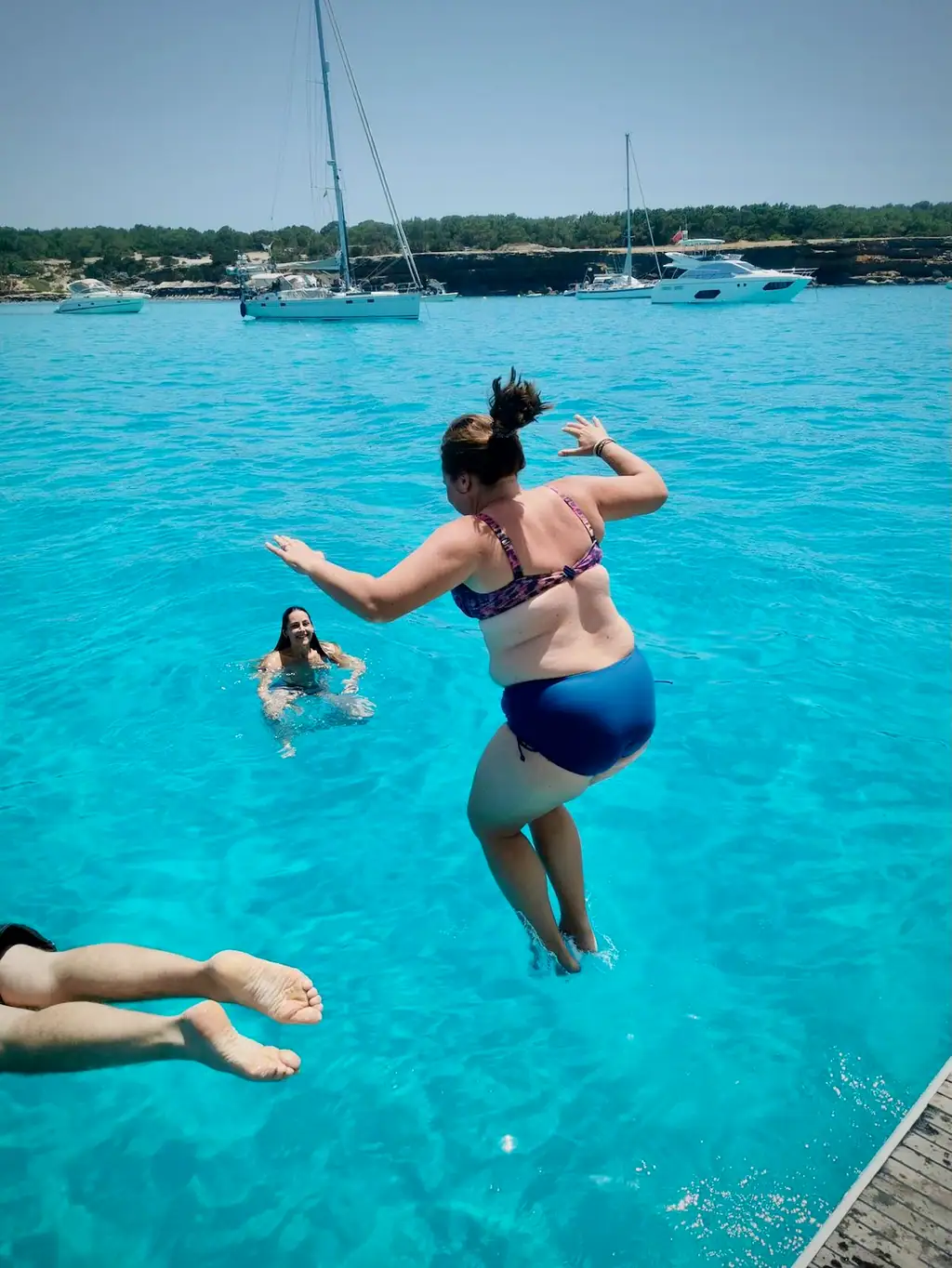 Jumping into the sea in Formentera