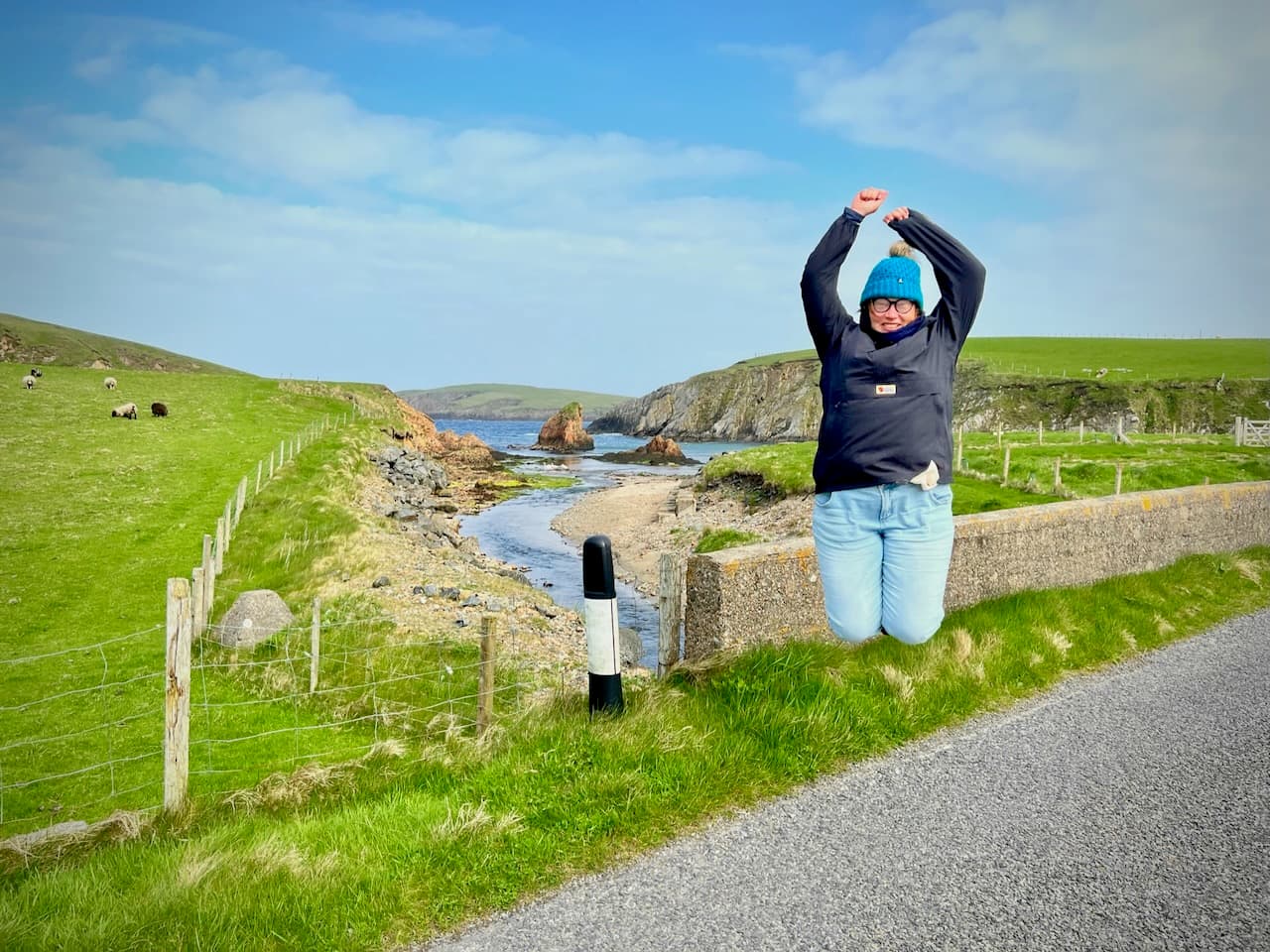 J. jumping in Spiggie Beach